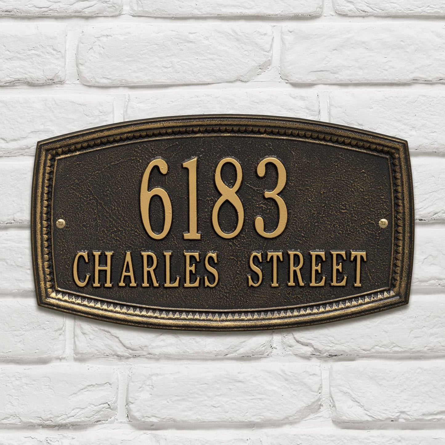 Custom black address plaque with raised bronze numbers and letters displaying "6183 Charles Street," featuring a traditional arched border, part of Home & Decor and USA Made collections.
