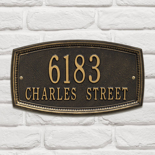 Custom black address plaque with raised bronze numbers and letters displaying "6183 Charles Street," featuring a traditional arched border, part of Home & Decor and USA Made collections.