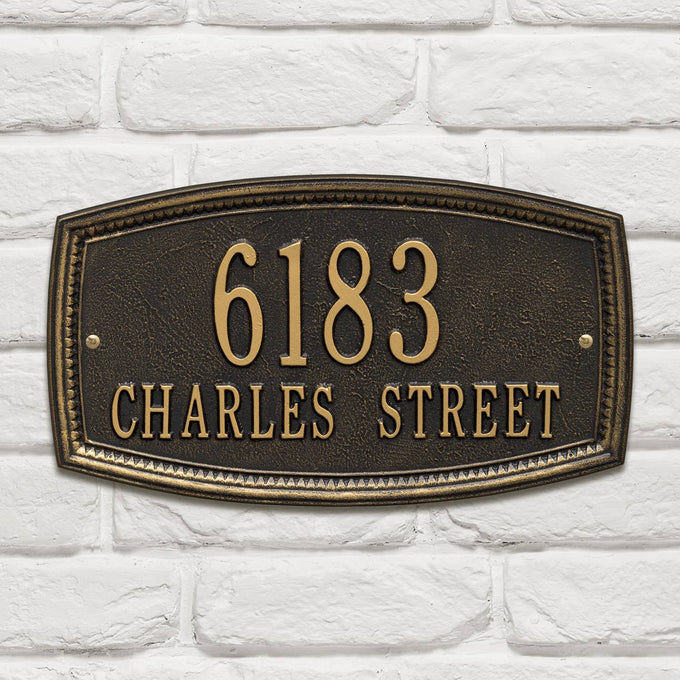 Custom black address plaque with raised bronze numbers and letters displaying "6183 Charles Street," featuring a traditional arched border, part of Home & Decor and USA Made collections.