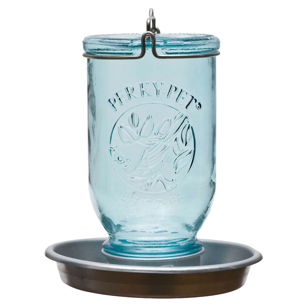 Antique-style blue glass Mason jar with embossed bird and leaf design, featuring a galvanized metal base and circular perch, handcrafted for farm, garden, and animal care use.