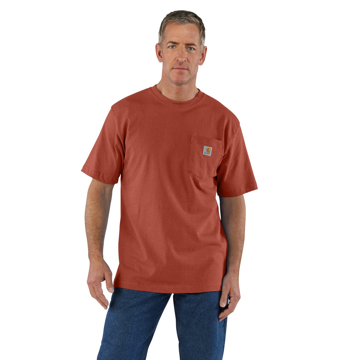 Man wearing a handcrafted heavyweight rust-colored pocket t-shirt with rib-knit crewneck and loose fit, paired with blue jeans, featured in Clothing and Accessories and Best Sellers collections.