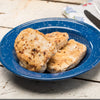 Three seasoned, pan-seared chicken breasts served on a speckled blue enamelware plate, evoking farmhouse kitchen and best sellers collections.
