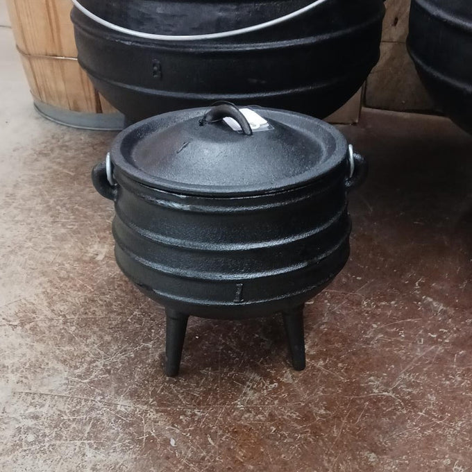 Unique handcrafted cast iron campfire kettle with three sturdy legs and fitted lid, designed for outdoor cooking in Farm, Garden & Tool, Camping, Best Sellers, and Promo Eligible collections.