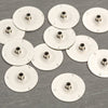 Small metal wick tabs with a 9/16 inch base, designed for use in container or votive candles, made in USA, featured in Lamps & Lighting and Candlemaking Supplies collections.