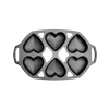 Cast iron mini cake pan with six heart-shaped cavities, designed for baking petite cakes, handcrafted in USA, featured in Kitchen & Food, Cookware, Cast Iron, and Baking Supplies collections.