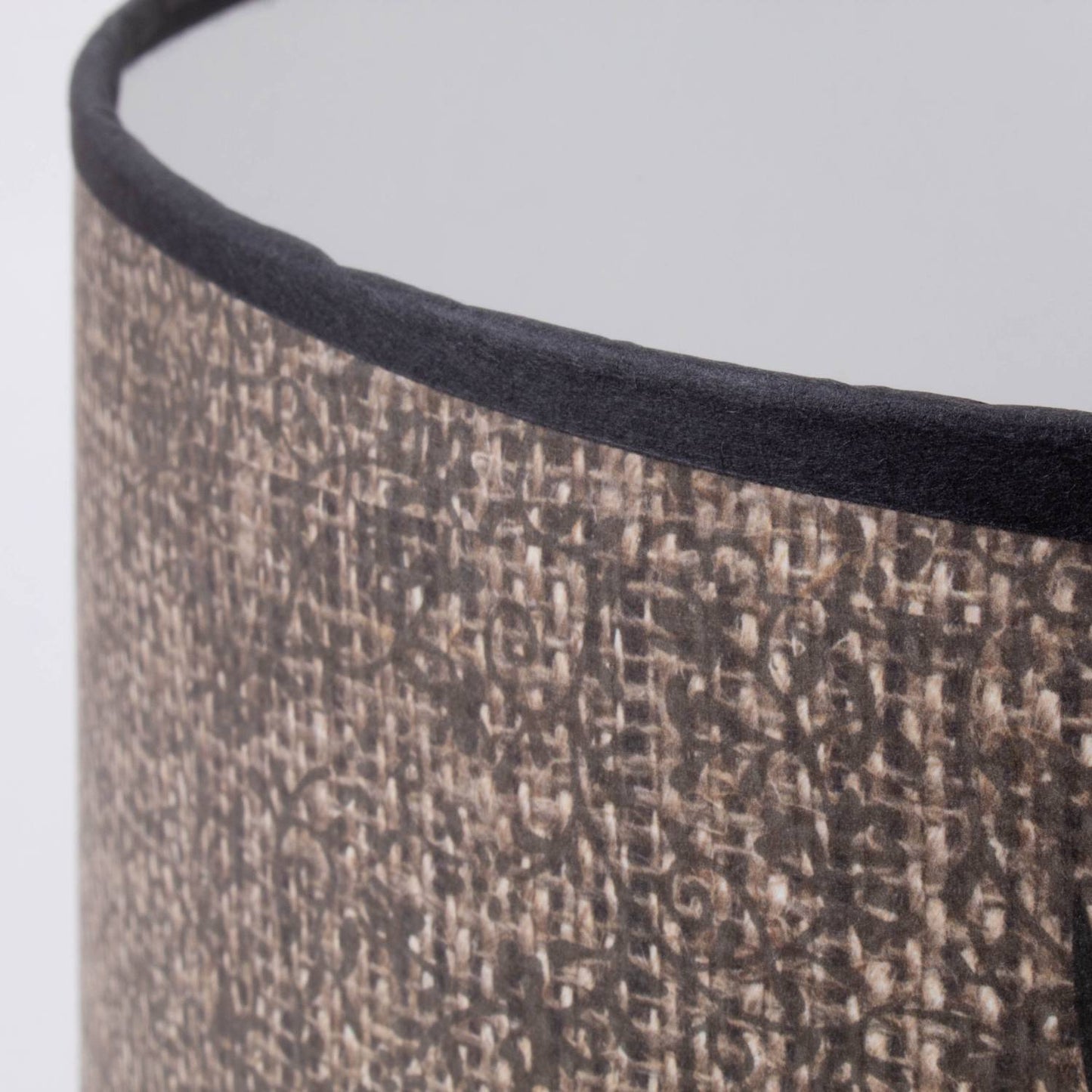 Close-up of a handcrafted parchment lamp shade in earthy tones with a textured woodland pattern, part of Lamps & Lighting, Parts and Accessories, Lamp Shades, Best Sellers, and Promo Eligible collections.