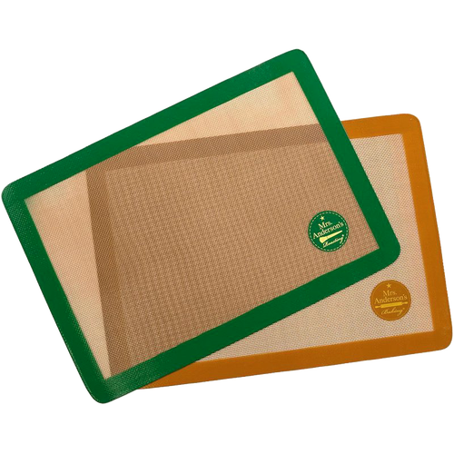 Set of two non-stick silicone half-size baking mats with woven glass fibers, featuring green and orange borders for versatile use in baking and roasting, ideal for Kitchen & Food and Baking Supplies collections.