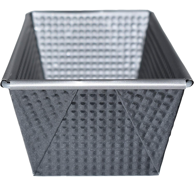 Heavy gauge steel loaf pan with nonstick corrugated surface, tapered sides, and square folded corners, designed for smaller bread loaves, ideal for Kitchen & Food and Baking Supplies collections.