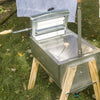 Amish-inspired hand washer featuring a stainless steel basin, clear lid, wooden crank handle, and sturdy wooden legs, designed for efficient laundry in Home & Decor and USA Made collections.