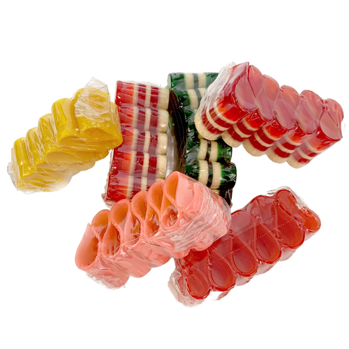 Variety of handcrafted, colorful handspun ribbon candy in assorted flavors including peppermint and fruit, individually wrapped and perfect for Kitchen & Food, Snacks and Sweets, and USA Made collections.