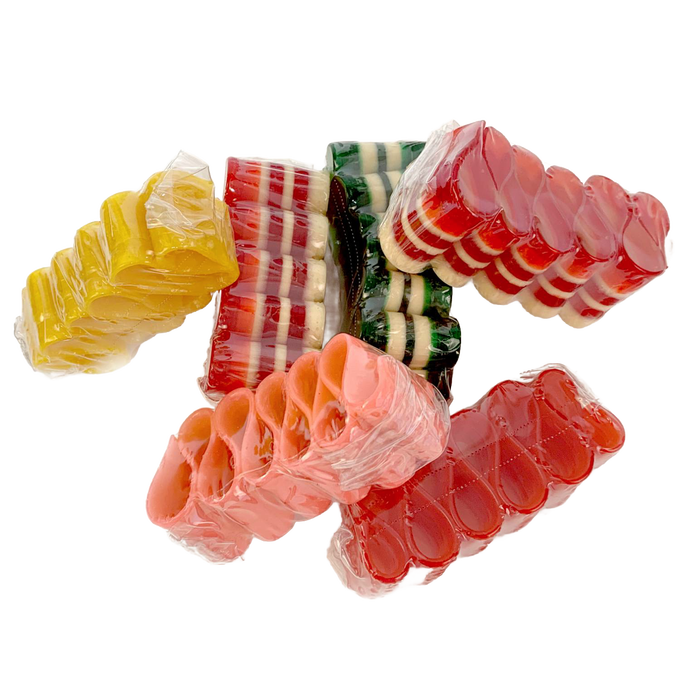 Variety of handcrafted, colorful handspun ribbon candy in assorted flavors including peppermint and fruit, individually wrapped and perfect for Kitchen & Food, Snacks and Sweets, and USA Made collections.