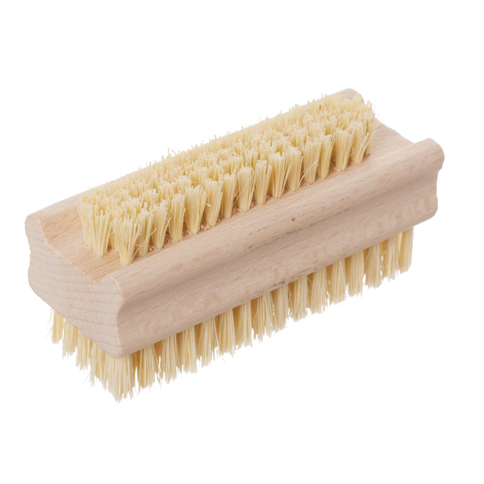 Compact nail brush with firm natural bristles and a durable untreated beechwood handle, handcrafted in Poland for effective cleaning, featured in Health & Wellness and Grooming collections.