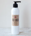 White 8-ounce pump bottle of handcrafted all-natural tea tree face wash with a brown label, made in the USA and featured in Health & Wellness and Grooming collections.