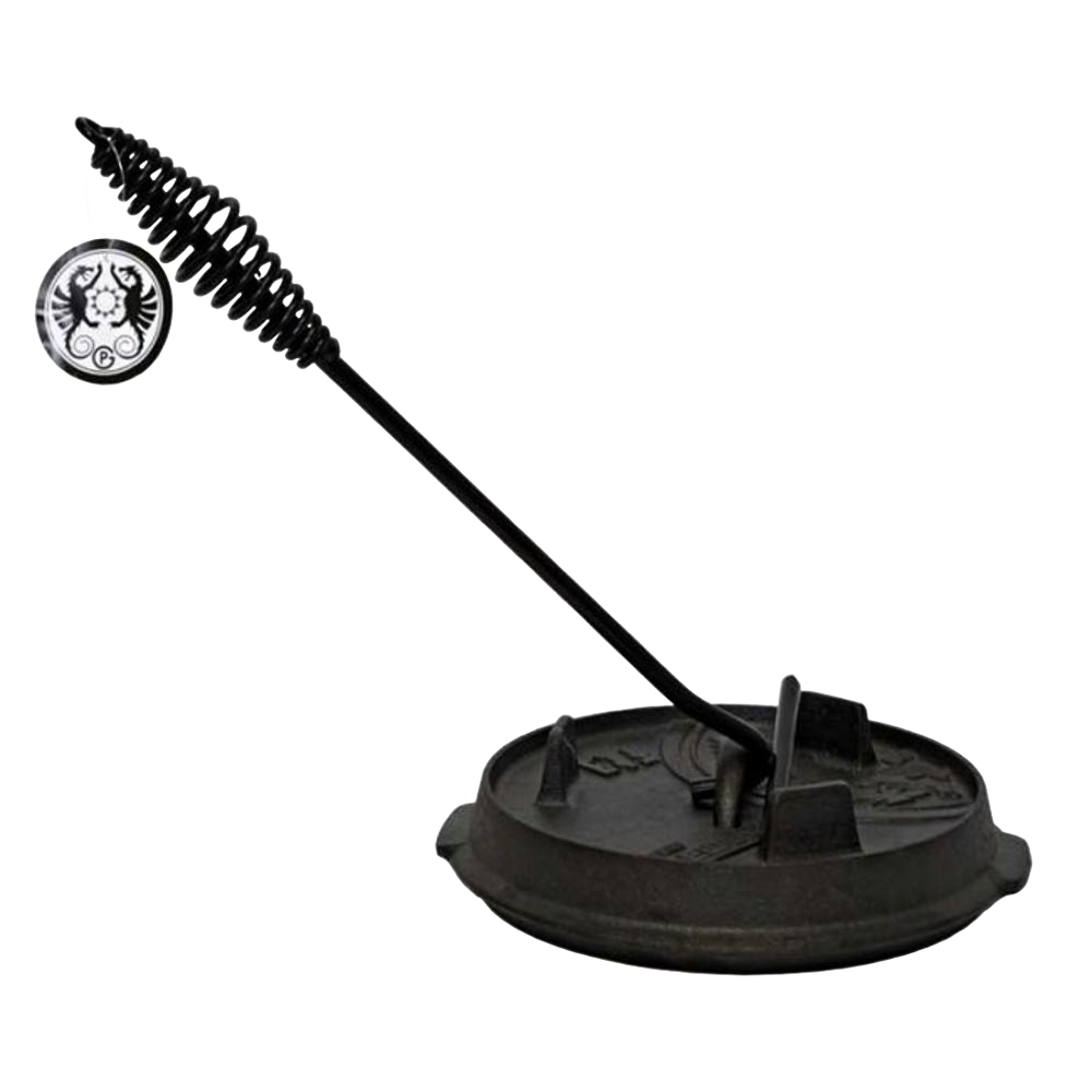 Black metal lid lifter with coiled handle resting on a seasoned cast iron pot lid, designed for safe handling during camping and outdoor cooking, featured in Farm, Garden & Tool and Best Sellers collections.