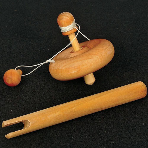 Handcrafted wooden spinning top with smooth finish and string pull, made in USA, perfect for indoor play and part of wooden toys and children's toys collections.