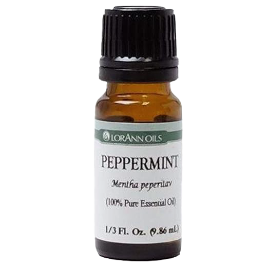 Amber glass bottle with black cap containing pure Peppermint essential oil, handcrafted and quality tested for aromatherapy, Health & Wellness, soapmaking, and candlemaking uses.