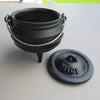 Small cast iron pot with three built-in legs and a detachable lid stamped "Midi," featuring a metal handle, ideal for outdoor dining, part of Kitchen & Food and Cast Iron collections.