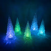 Set of five translucent acrylic Christmas trees glowing softly in changing colors of blue, green, and purple, perfect for festive holiday decor in Home & Decor collections.