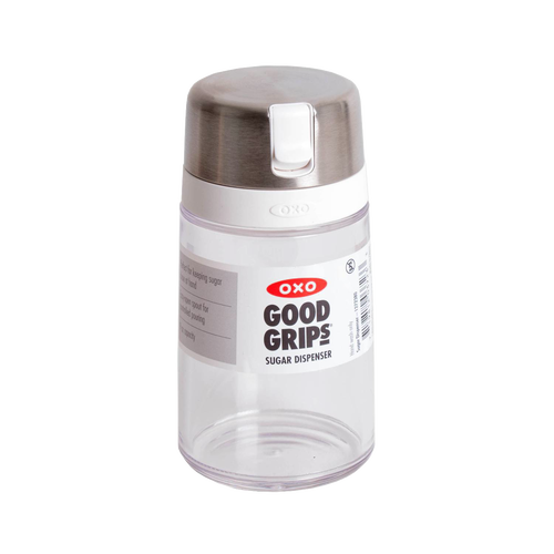 Clear glass sugar dispenser with stainless steel flip-top lid and easy-pour spout, designed to prevent clumping, ideal for Kitchen & Food, Kitchen Gadgets, Kitchen Accessories, Storage and Serving, Best Sellers, and Promo Eligible collections.