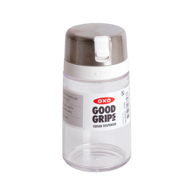 Clear glass sugar dispenser with stainless steel flip-top lid and easy-pour spout, designed to prevent clumping, ideal for Kitchen & Food, Kitchen Gadgets, Kitchen Accessories, Storage and Serving, Best Sellers, and Promo Eligible collections.
