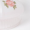 Close-up of a handcrafted glass lamp shade featuring a soft white base with delicate red rose and green leaf design, part of Lamps & Lighting and Best Sellers collections.