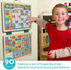 Young child interacting with a handcrafted magnetic responsibility chart featuring colorful magnets and hinged dry-erase boards, designed for promoting positive habits in indoor play, children's toys, and best seller collections.