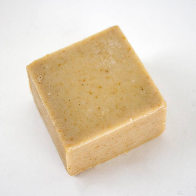 Handcrafted hypoallergenic bar soap in a natural beige tone with subtle speckles, made in USA, ideal for Health & Wellness, Grooming & Personal Hygiene, Soaps, and USA Made collections.