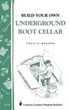 Cover of a heritage lifestyle book showing a vintage-style illustration of a person placing produce in an underground root cellar, with decorative green side border featuring hand tools, ideal for Books, Heritage and Lifestyle, and Best Sellers collections.