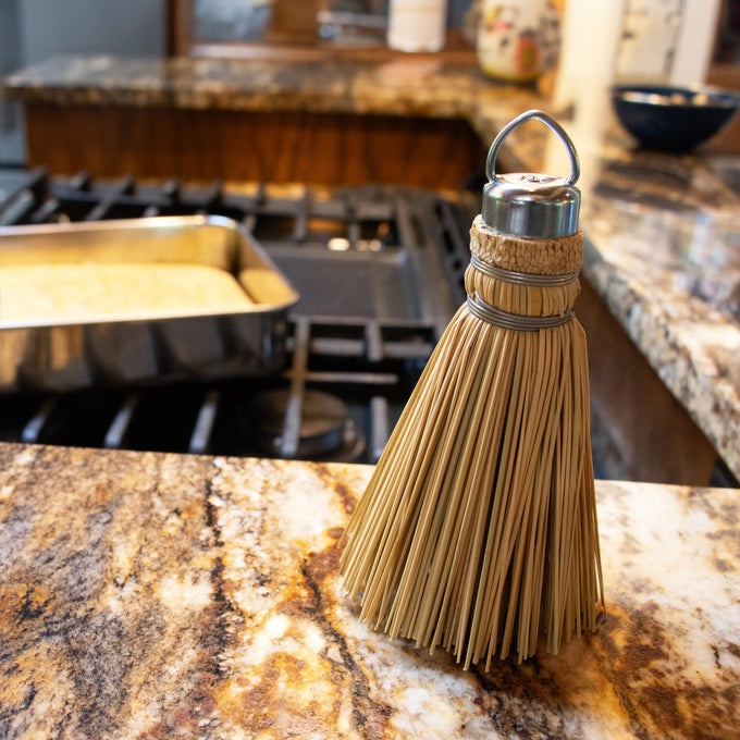 Miniature handcrafted straw broom with metal cap and hanging loop, made in USA, perfect for easily testing cakes without large holes, featured in Kitchen & Food and Cooking Helpers collections.