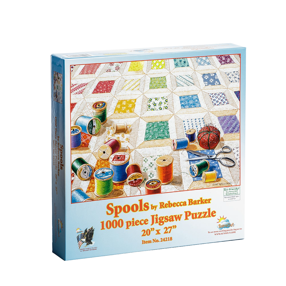 Boxed 1000-piece jigsaw puzzle featuring vibrant colorful spools of thread scattered on a hand-sewn quilt pattern, handcrafted and made in USA, ideal for Toys, Books & Games and USA Made collections.