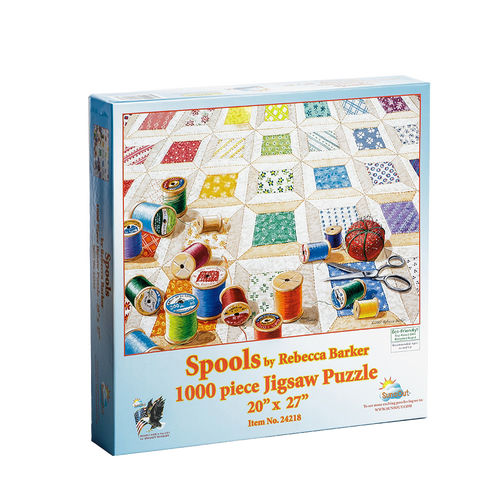 Boxed 1000-piece jigsaw puzzle featuring vibrant colorful spools of thread scattered on a hand-sewn quilt pattern, handcrafted and made in USA, ideal for Toys, Books & Games and USA Made collections.