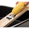 Handcrafted wooden corn cutter with smooth-sanded hardwood handle and stainless steel blades, removing kernels quickly for food prep and preservation in Kitchen & Food collections.