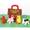 Soft plush barnyard animal toys including a duck, pig, cow, and rooster, with a red barn-shaped carrying case, ideal for indoor play and children's toys collections.