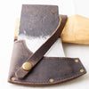 Heavy-duty axe head with a durable leather sheath featuring brass rivets and snap closure, resting on a smooth wooden handle, part of Farm, Garden & Tool and Best Sellers collections.