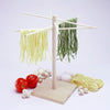 Compact wooden rack with eight angled arms for drying fresh homemade pasta, handcrafted from eco-friendly rubberwood, featured in Kitchen & Food and Drying collections.