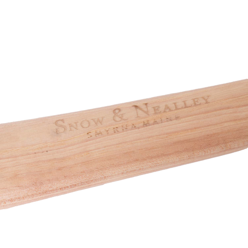 Close-up of a smooth hickory handle engraved with Snow & Nealley branding, showcasing handcrafted detail and Amish made quality for farm, garden, and wood cutting tools.