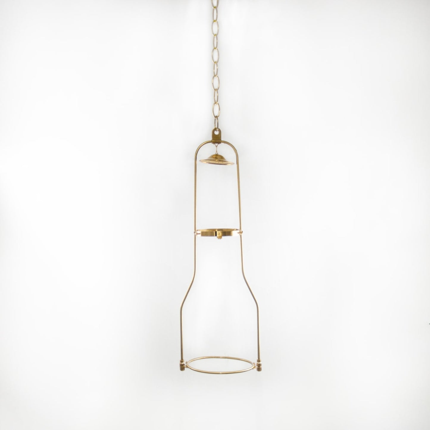 Solid brass hanging bracket with tilt frame design suspended from a chain, suited for oil lamps, featured in Lamps & Lighting and Hanging Lamps collections.
