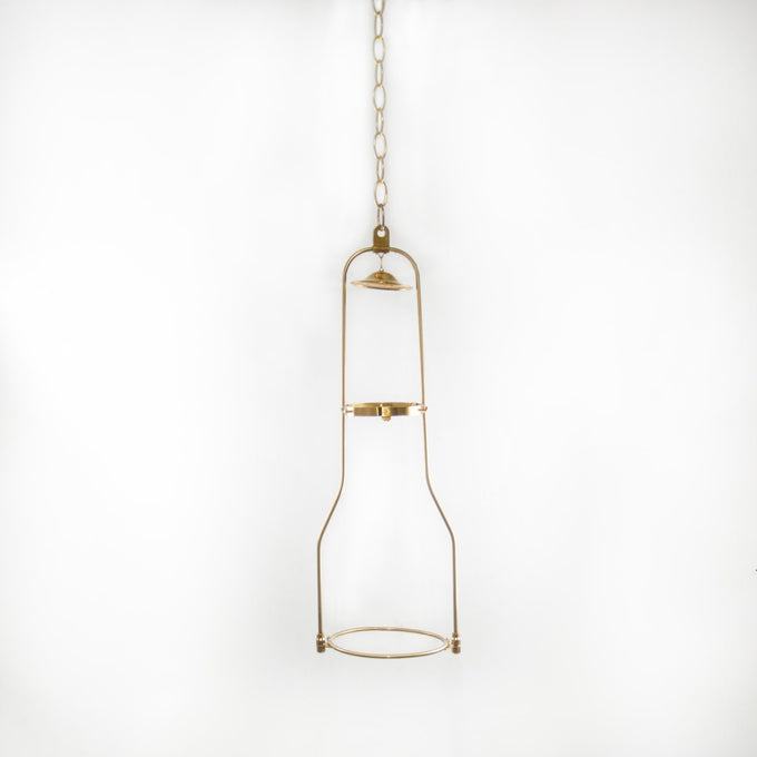 Solid brass hanging bracket with tilt frame design suspended from a chain, suited for oil lamps, featured in Lamps & Lighting and Hanging Lamps collections.