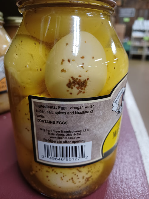 Glass jar of natural canned eggs preserved in mustard brine with visible spices, featuring a vintage-style label, ideal for Kitchen & Food, Pantry, USA Made, Best Sellers, and Promo Eligible collections.