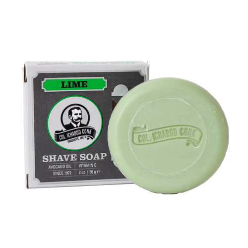 Small lime shaving soap bar embossed with brand logo, displayed next to its boxed packaging, featuring moisturizing ingredients and included in Health & Wellness, Grooming, Soaps, USA Made, and Best Sellers collections.