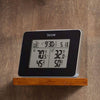 Compact digital weather station displaying indoor and outdoor temperature and humidity readings with time, date, and alarm clock, ideal for Home & Decor, Household Helpers, and Best Sellers collections.