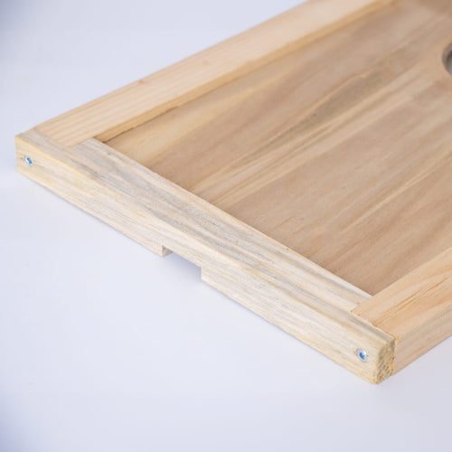 Handcrafted Amish made wooden hive inner cover with a central notch for ventilation, designed for moisture control in beekeeping and featured in USA made farm, garden, and tool collections.