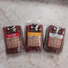 Three clear packs of handcrafted beef sticks in spicy hot, original, and hickory flavors, made in USA, ideal for Kitchen & Food, Snacks and Sweets, Meats, Holiday Hosting, USA Made, Best Sellers, and Promo Eligible collections.