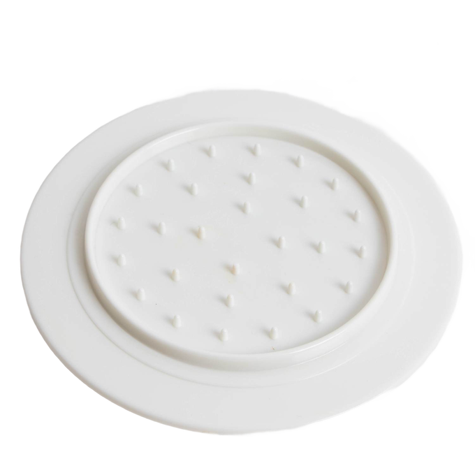 White food prep grip mat with raised non-slip bumps, designed to securely hold vegetables during slicing and chopping, ideal for Kitchen & Food, Food Prep, and Best Sellers collections.