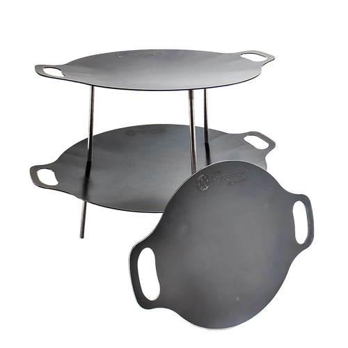 Two-tier steel griddle and fire bowl set with integrated handles and detachable legs, designed for stable outdoor cooking, ideal for Farm, Garden & Tool, Camping, Best Sellers, and Promo Eligible collections.