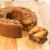 Handcrafted butterscotch coffee cake made in USA with sweet molasses and crunchy walnuts, shown sliced on a wooden board, part of Kitchen & Food and Snacks and Sweets collections.