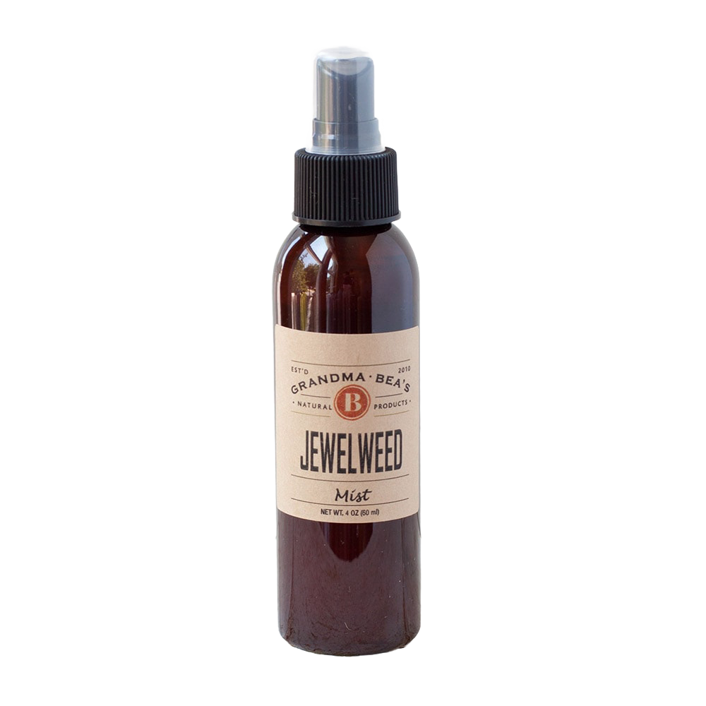 Amber spray bottle with natural label reading "Jewelweed Mist," designed for Health & Wellness, Balms, Creams and Lotions, and USA Made collections.