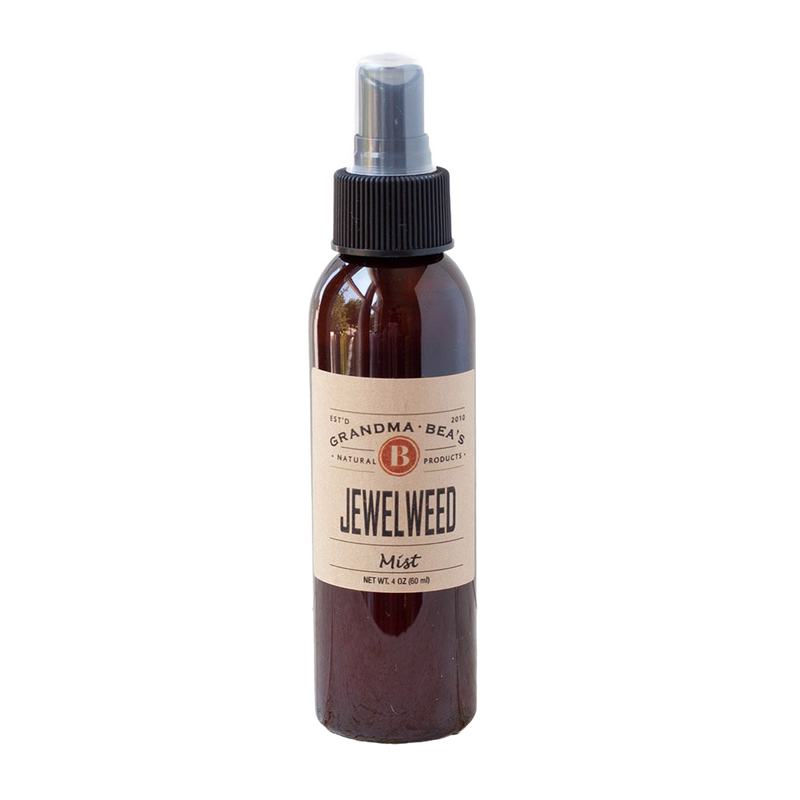 Amber spray bottle with natural label reading "Jewelweed Mist," designed for Health & Wellness, Balms, Creams and Lotions, and USA Made collections.