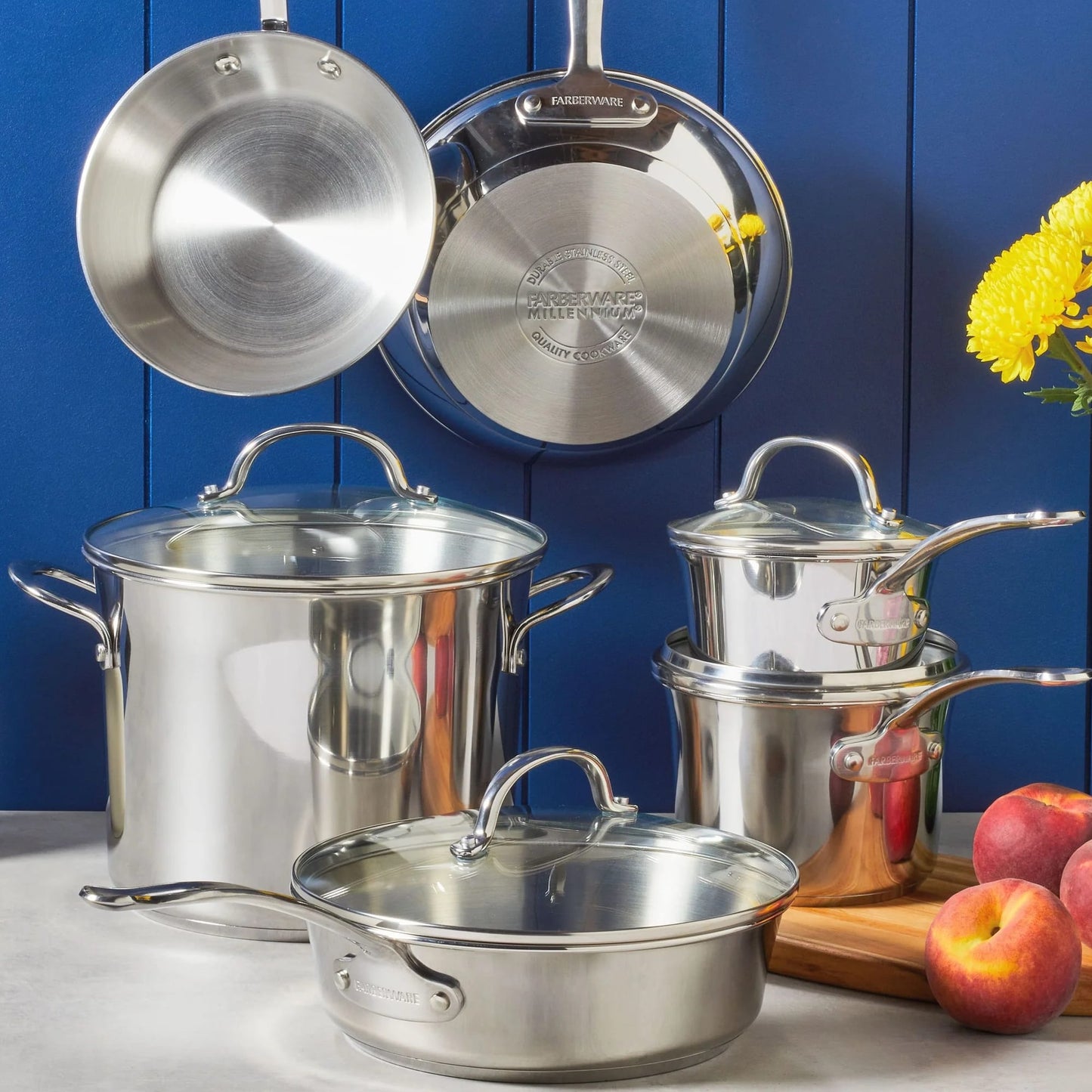 Set of polished stainless steel cookware including saucepans, stockpot, frying pans with glass lids, designed for durable everyday kitchen use in Kitchen & Food and Cookware collections.