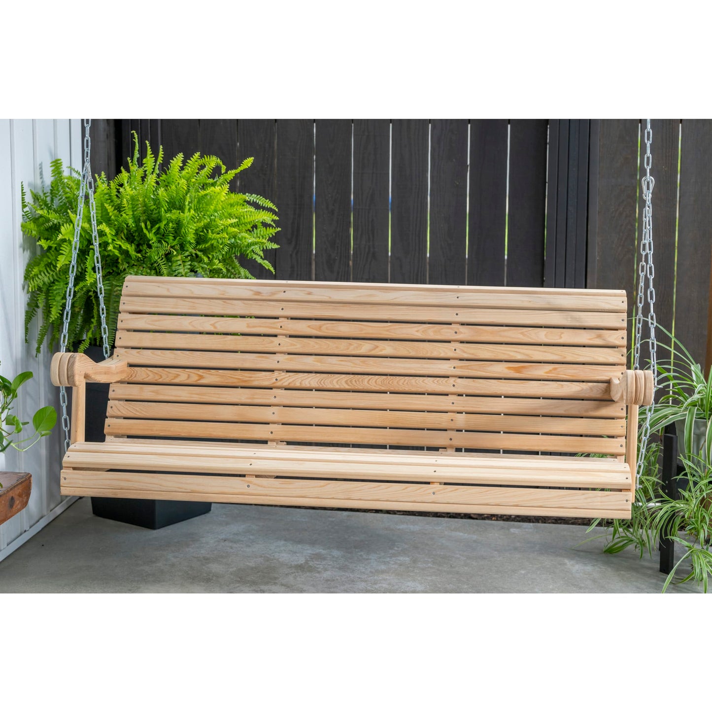 Handcrafted Amish-made cypress wood 5-foot porch swing with slatted seat and back, suspended by metal chains, ideal for Home & Decor, Outdoor Furniture, USA Made, and Best Sellers collections.